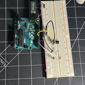 Using the button example provided, I added our own button to the previous circuit and updated teh code in add a button variable that could turn on the lights.
